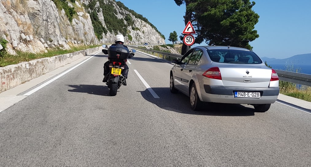 Image result for motorbike being overtaken