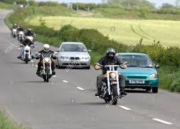 Image result for motorbike being overtaken