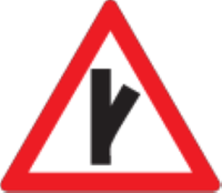 There is a sharp junction ahead, to the right
