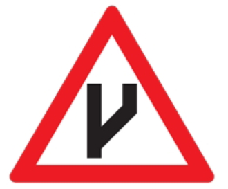 Warns that the single carriageway is ending ahead
