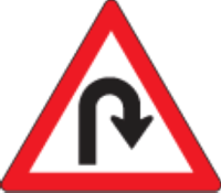 Very sharp, U-shaped curve ahead to the right.