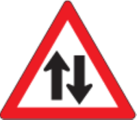Two-way traffic ahead on the one-way road you are travelling on
