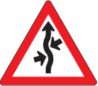 Coming up is a concealed entrance to the left followed by one to the right