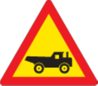 Trucks crossing, proceed carefully
