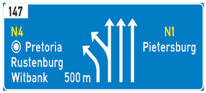 The freeway will splits ahead and the lanes lead to different destinations as indicated.
